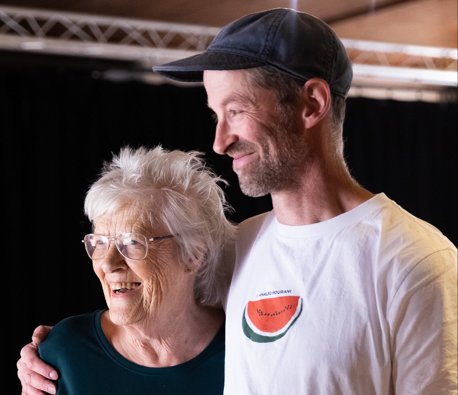 Christine and Robbie embracing one another.