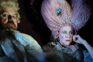 Nick Frost and Alice Lowe dressed in gaudy French-style 17th century outfits.