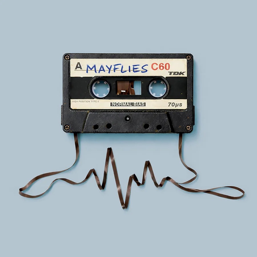 A vintage TDK C60 cassette tape with Mayflies handwritten on the label and magnetic tape shaped into a waveform for Edinburgh Fringe theatre.